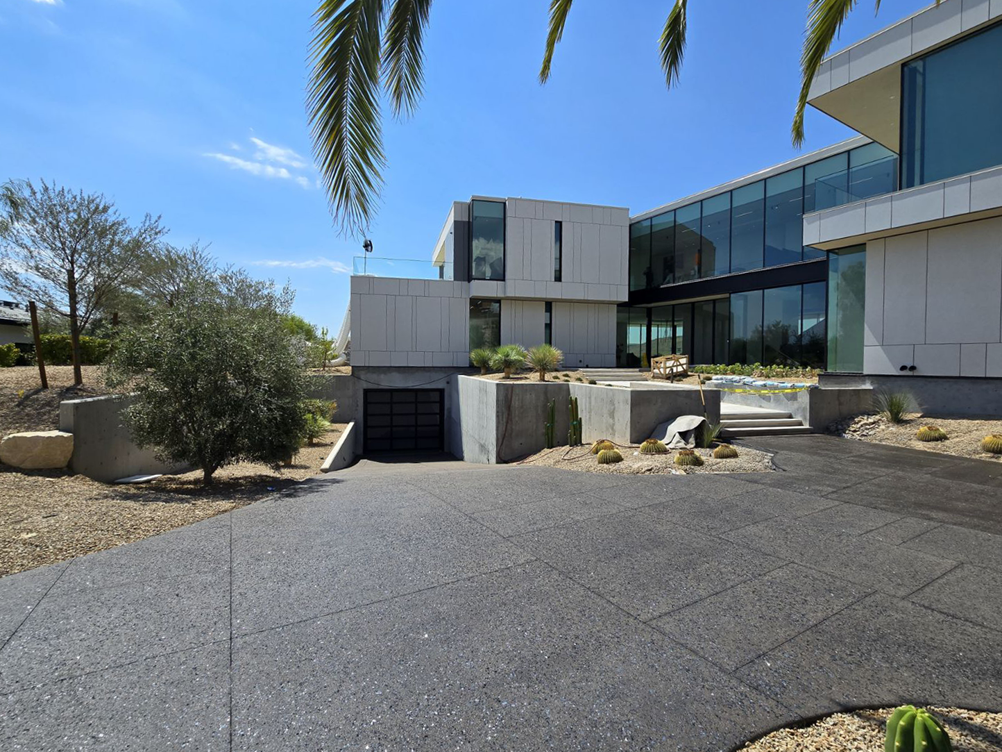 Custom residence with architectural concrete by DCI